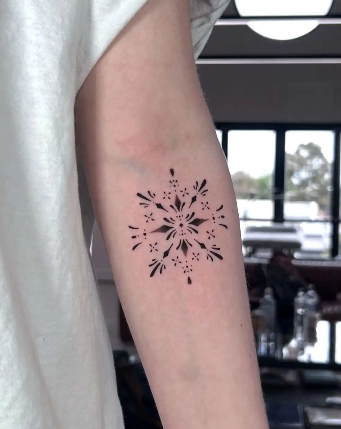 Pattern tattoo with dotwork and symmetrical design by Ayah at Omnia Tattoo Melbourne